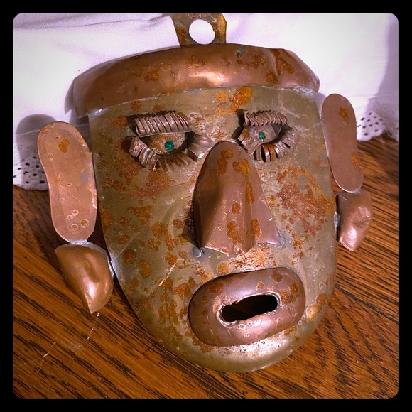 Antique folk art tin mask